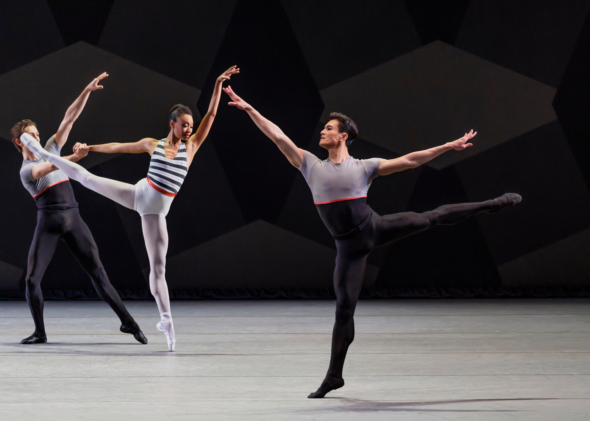 Everywhere We Go series — Everywhere We Go — trio with extended arabesques in striped and grey costumes