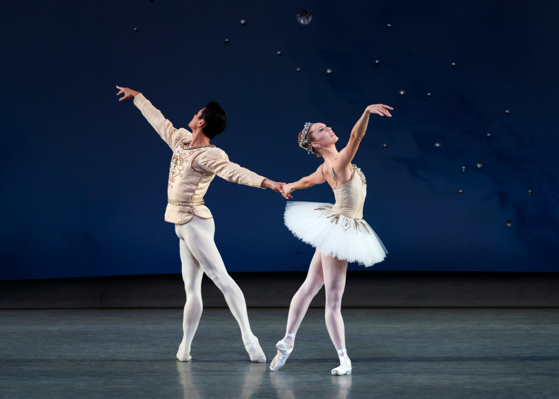 Diamonds series — Diamonds — partnered pose hand in hand with ballerina in white tutu and tiara