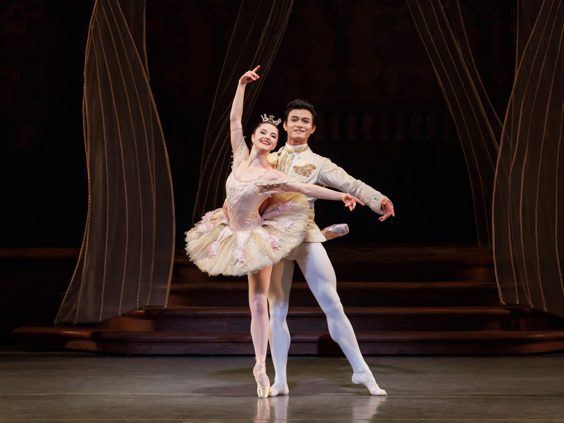 The Sleeping Beauty series — The Sleeping Beauty — Aurora and Prince in pink and gold court attire framed by tasseled curtains