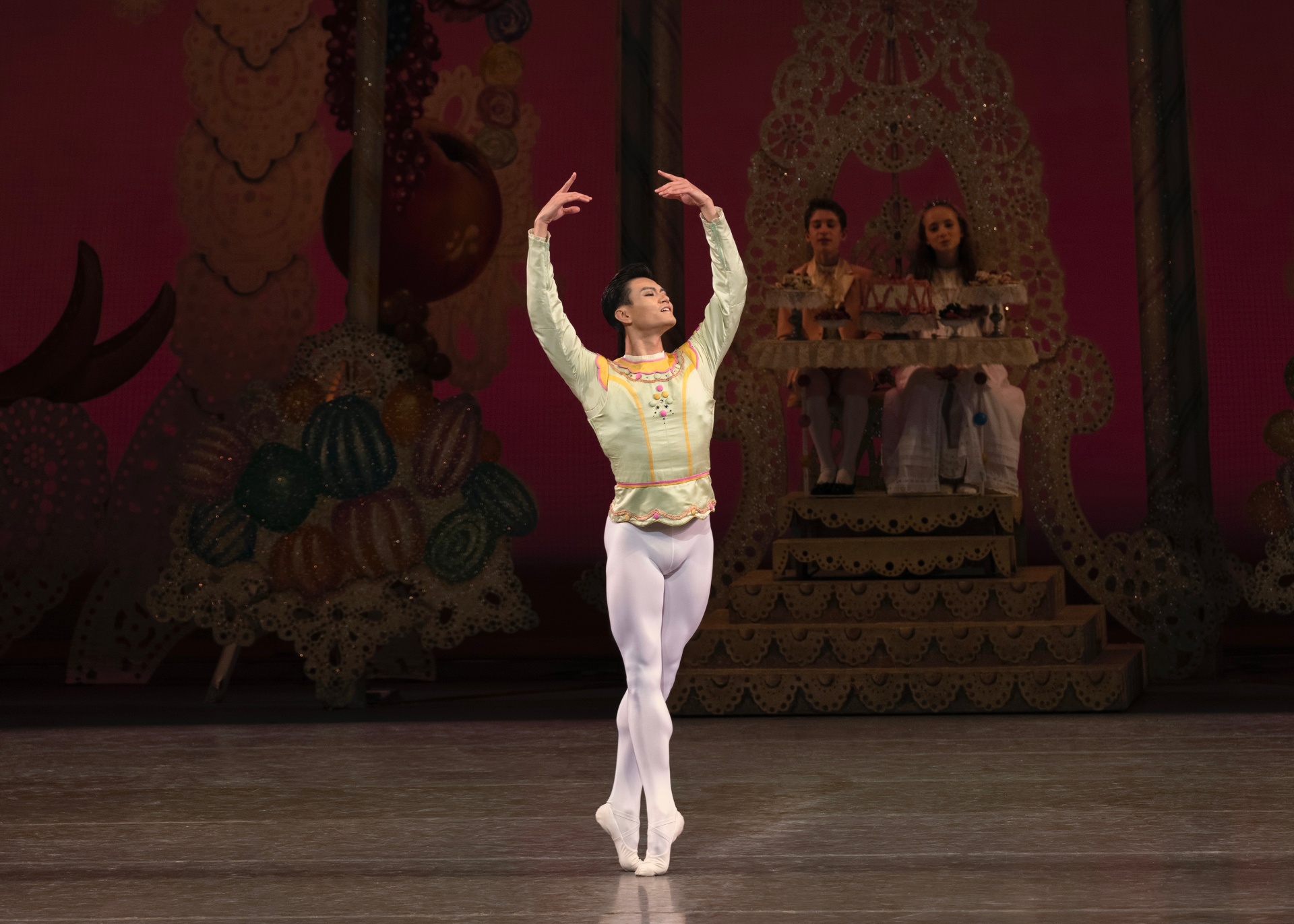 George Balanchine's The Nutcracker series — The Nutcracker — Cavalier solo with arms in fifth position en pointe before the Land of Sweets