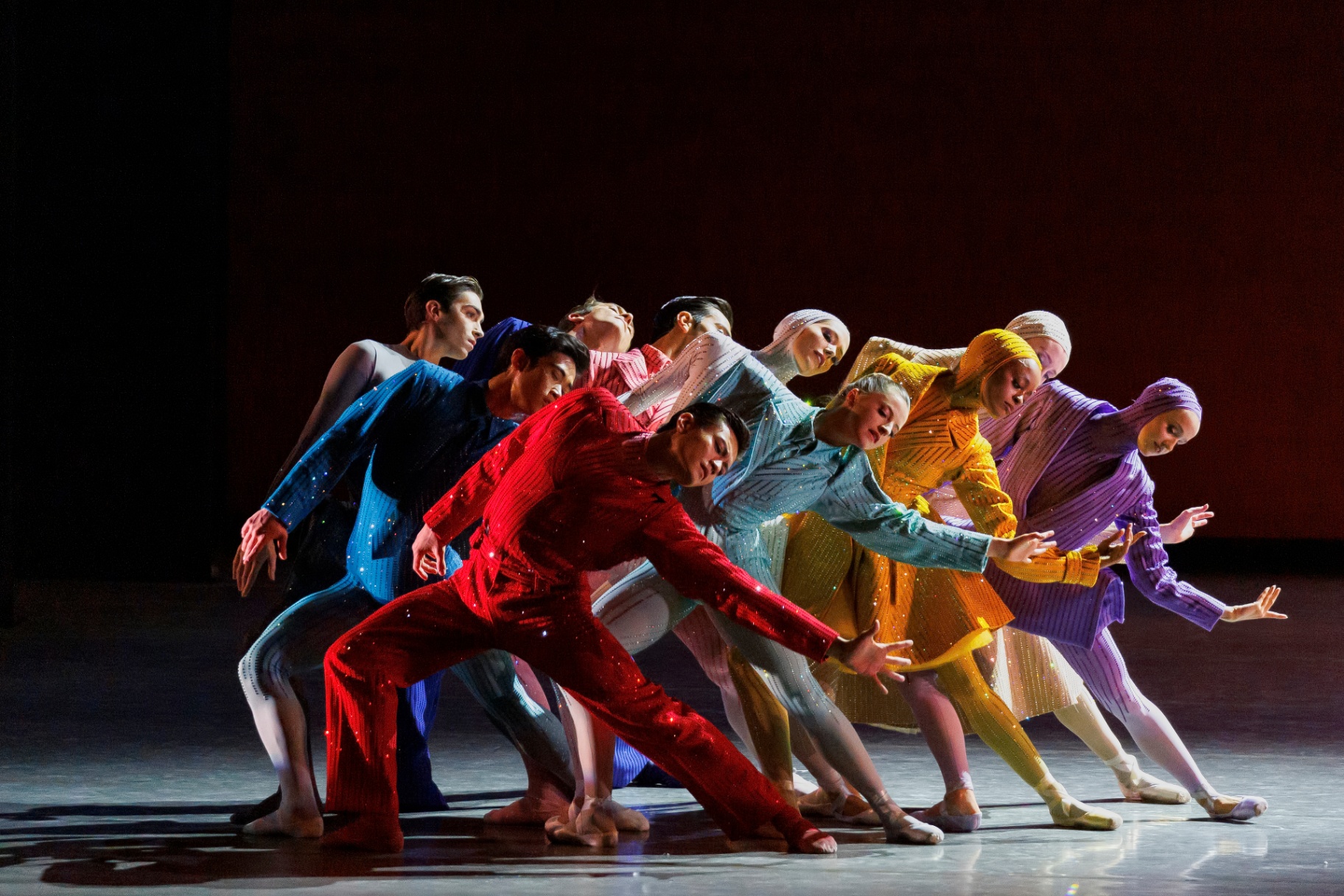 Play Time series — Play Time — ensemble of ten dancers clustered in jewel-toned Swarovski-crystal pinstripe suits by Alejandro Gómez Palomo